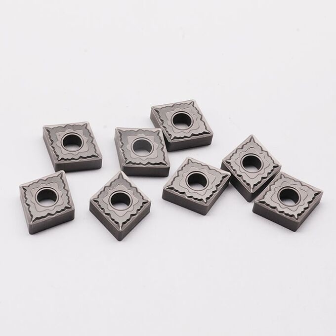 เม็ดมีดกลึงแบบเซอร์เมทสำหรับการกัดกร่อนสำหรับเหล็กกล้าคาร์บอน CNMG120408-FX
